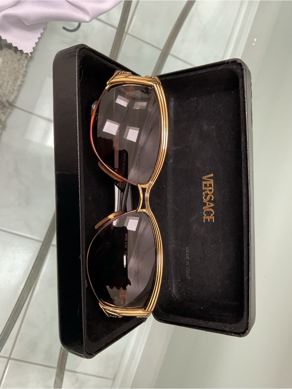 Versace Gold and Black Womens
Sunglasses
